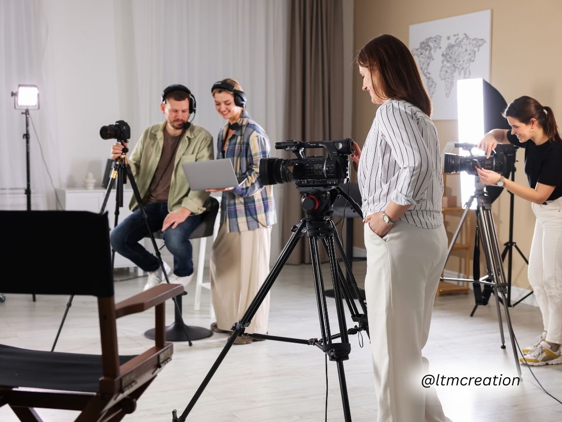 Corporate team filming a brand story video with professional lighting and camera setup.